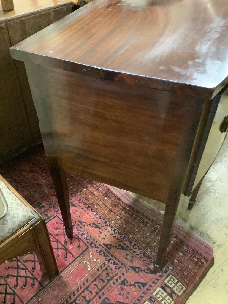 A late 19th century Sheraton style mahogany bowfront sideboard, fitted three drawers, length 140cm, depth 58cm, height 89cm